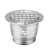 A silver reusable coffee capsule on a white background. Náhled obrázku produktu