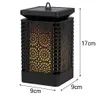 A black solar lantern with a flame effect, showing dimensions. Podgląd zdjęcia produktu