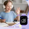 A young girl wearing headphones and a smartwatch is sitting at a desk, seemingly engaged in online learning or a video call. Produktbild-Vorschau