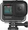 A GoPro protective housing is shown from the front. Voir les images du produit