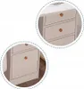 Close-up views of a white desk with wooden drawer pulls. Produktbild-Vorschau