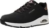 A black Skechers women's sneaker with white soles and rose gold accents. Náhled obrázku produktu