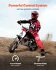 A child in motocross gear riding a dirt bike on a dirt track. Produktbild-Vorschau
