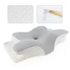 A close-up of an ergonomic neck pillow with a grey top and white quilted base. Produktbild-Vorschau