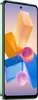 A smartphone with a green casing is shown against a background of abstract geometric shapes and spheres. Náhled obrázku produktu