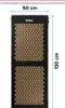 A black acupressure mat with wooden spikes, shown flat against a white background with dimensions indicated. Náhľad obrázku produktu