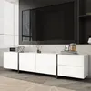 A modern white TV stand with a large black television mounted above it, set against a marble-patterned wall. Náhľad obrázku produktu