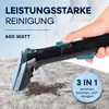 A hand is holding a cleaning device over a stained carpet, spraying liquid. Text overlays describe the product's features and power. Voir les images du produit