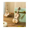A wooden model of a cello and a wooden Eiffel Tower model are displayed on a wooden table next to a light blue gift box with a gold ribbon. Anteprima dell’immagine prodotto