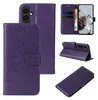 A collage of images showing a purple floral butterfly flip phone case from multiple angles. Produktbild-Vorschau