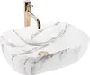 A white oval vessel sink with a marble-like pattern and a gold faucet. Náhľad obrázku produktu