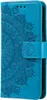 A blue flip case cover for a Samsung Galaxy A34 5G phone with a mandala pattern embossed on it. Produktbild-Vorschau