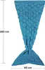 A blue mermaid tail blanket is shown vertically with dimensions indicated. Anteprima dell’immagine prodotto