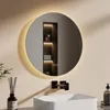 A modern bathroom vanity with a round LED mirror, sink, and faucet. Anteprima dell’immagine prodotto
