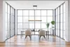 A modern dining room with large windows overlooking a city. Anteprima dell’immagine prodotto