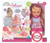 A child playing with a doll and accessories, presented in its retail packaging. Produktbild-Vorschau