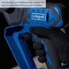 Close-up of a person's gloved hand holding a blue and black power tool. Voir les images du produit