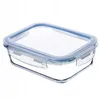 A clear studio shot of a glass food storage container with a blue lid. Podgląd zdjęcia produktu