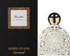 A perfume bottle and its packaging are displayed side-by-side against a white background. Podgląd zdjęcia produktu