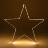 A lit star-shaped decoration against a dark background. Produktbild-Vorschau
