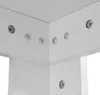 A close-up view of a white corner joint of a piece of furniture, secured with screws. Anteprima dell’immagine prodotto