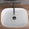 A top-down view of a white countertop sink with a modern faucet. Náhľad obrázku produktu