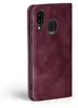 A close-up side view of a burgundy flip phone case for a Samsung Galaxy A40. Produktbild-Vorschau