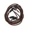 A close-up, top-down view of a braided audio cable with a right-angle 3.5mm jack and two smaller connectors. Náhled obrázku produktu