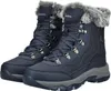 A pair of blue winter boots with gray soles and faux fur trim. Voir les images du produit
