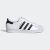 A white Adidas Superstar shoe with black stripes and accents, shown from the side against a white background. Podgląd zdjęcia produktu