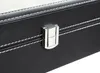 A close-up view of a black watch organizer with white stitching and a silver clasp. Produktbild-Vorschau