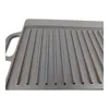 A close-up view of a cast iron grill plate. Produktbild-Vorschau