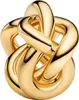 A close-up studio shot of a gold knot charm. Anteprima dell’immagine prodotto