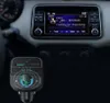 A car's dashboard with a car charger and the car's infotainment system. Anteprima dell’immagine prodotto