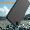 A black phone case is shown falling onto a rocky surface, with water droplets in the air. Produktbild-Vorschau