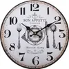 A round wall clock with a vintage design, featuring kitchen-themed illustrations and text. Anteprima dell’immagine prodotto