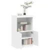 A white cabinet with open doors, displaying books and decorative items. Voir les images du produit