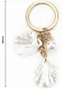 Portachiavi con conchiglia e perline, set regalo per donne Anteprima dell’immagine prodotto 4