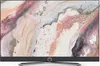 A television set with a colorful abstract image displayed on its screen, placed on a stand. Produktbild-Vorschau