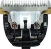 A close-up view of the internal mechanism of a hair clipper blade assembly. Anteprima dell’immagine prodotto