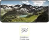 A smartphone screen displaying a mountain landscape, with a graphic overlay indicating 'Crystal clear'. Produktbild-Vorschau