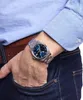 A person wearing a watch on their wrist, with their hand in their jeans pocket. Náhled obrázku produktu
