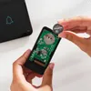 Hands are shown inserting a coin cell battery into the circuit board of a device, possibly a doorbell or remote. Anteprima dell’immagine prodotto