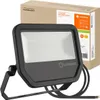 A black LED floodlight is shown in front of its packaging. Voir les images du produit