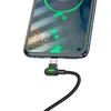 A close-up shot of a smartphone being charged by a USB-C cable with an LED indicator. Anteprima dell’immagine prodotto