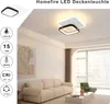 A modern living room with a sofa, coffee table, and a ceiling light. Produktbild-Vorschau