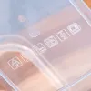 Close-up of symbols on a clear plastic food container lid. Podgląd zdjęcia produktu