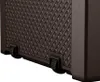 A close-up view of the bottom corner of a brown garden storage box, showing its textured surface and two wheels. Podgląd zdjęcia produktu