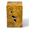 A close-up, studio shot of a wooden side table with a unique, organic design. Produktbild-Vorschau
