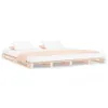 A bed frame made of wooden pallets with a mattress, two pillows, and a peach-colored throw blanket. Produktbild-Vorschau